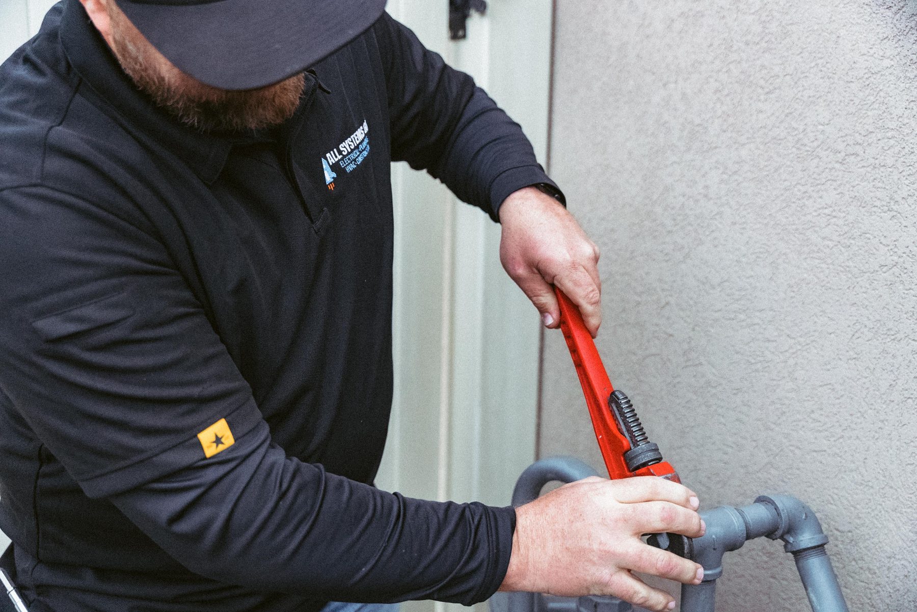 Electrician wiring a breaker panel