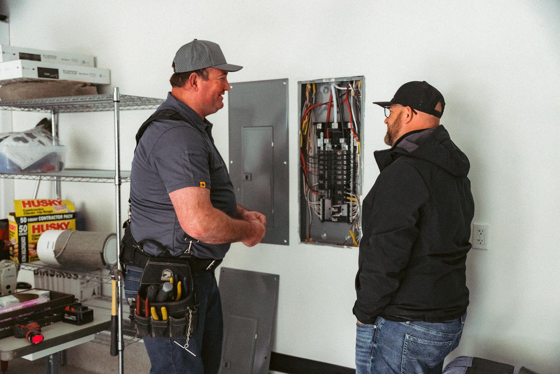 All Systems Go electricians inspecting a residential electrical panel